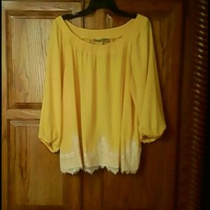 Yellow blouse.